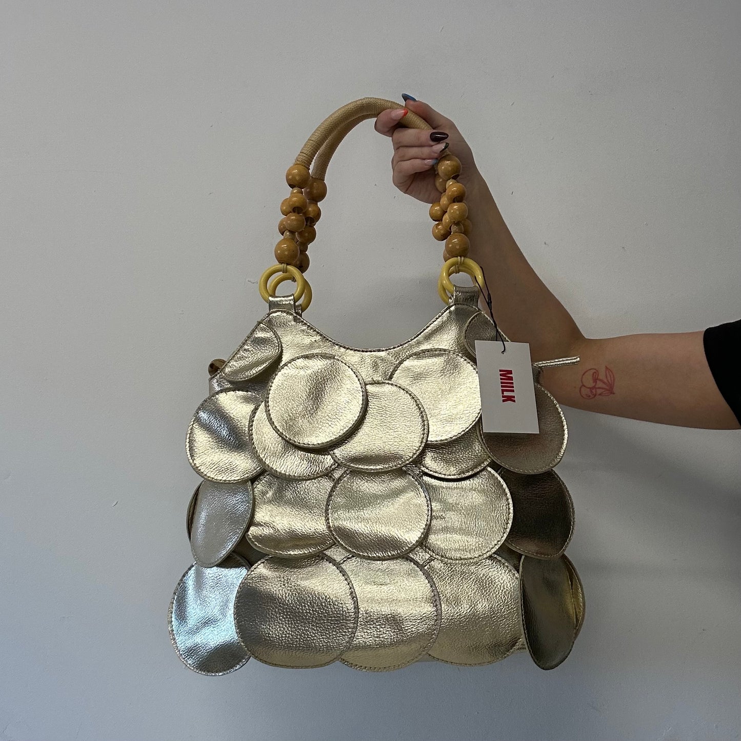 gold faux disc beaded shoulder bag