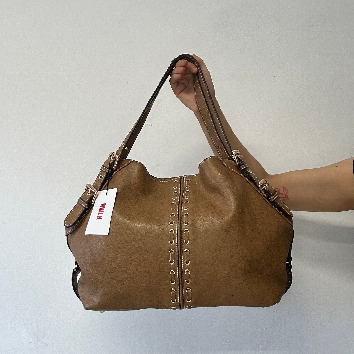 brown eyelet faux leather shoulder bag