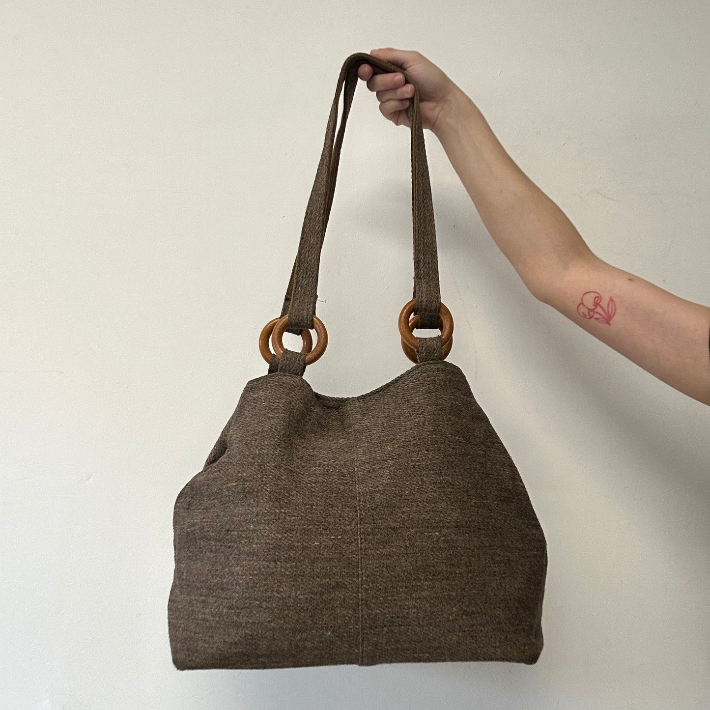 brown woven shoulder bag