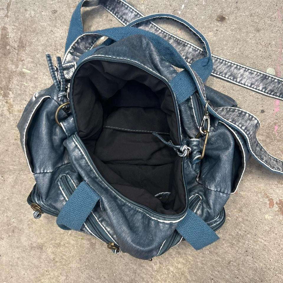 blue acid wash studded faux leather shoulder bag
