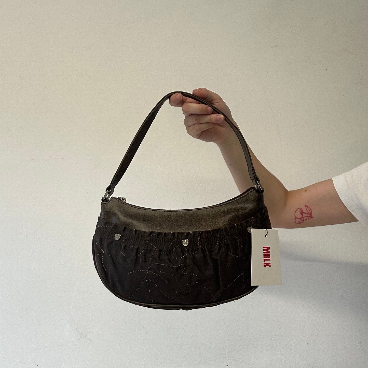 brown patterned faux leather shoulder bag