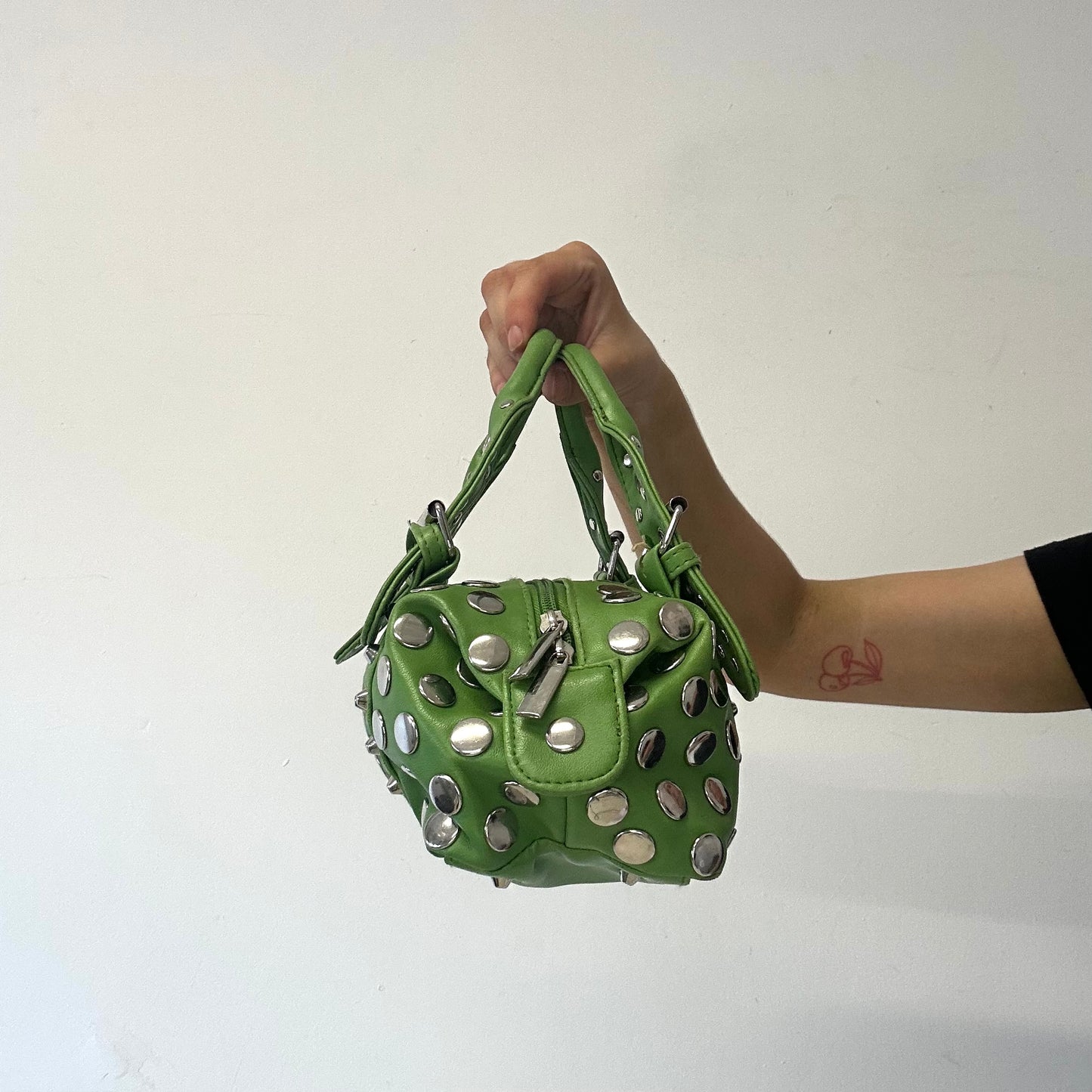 green studded double buckle mini hand bag