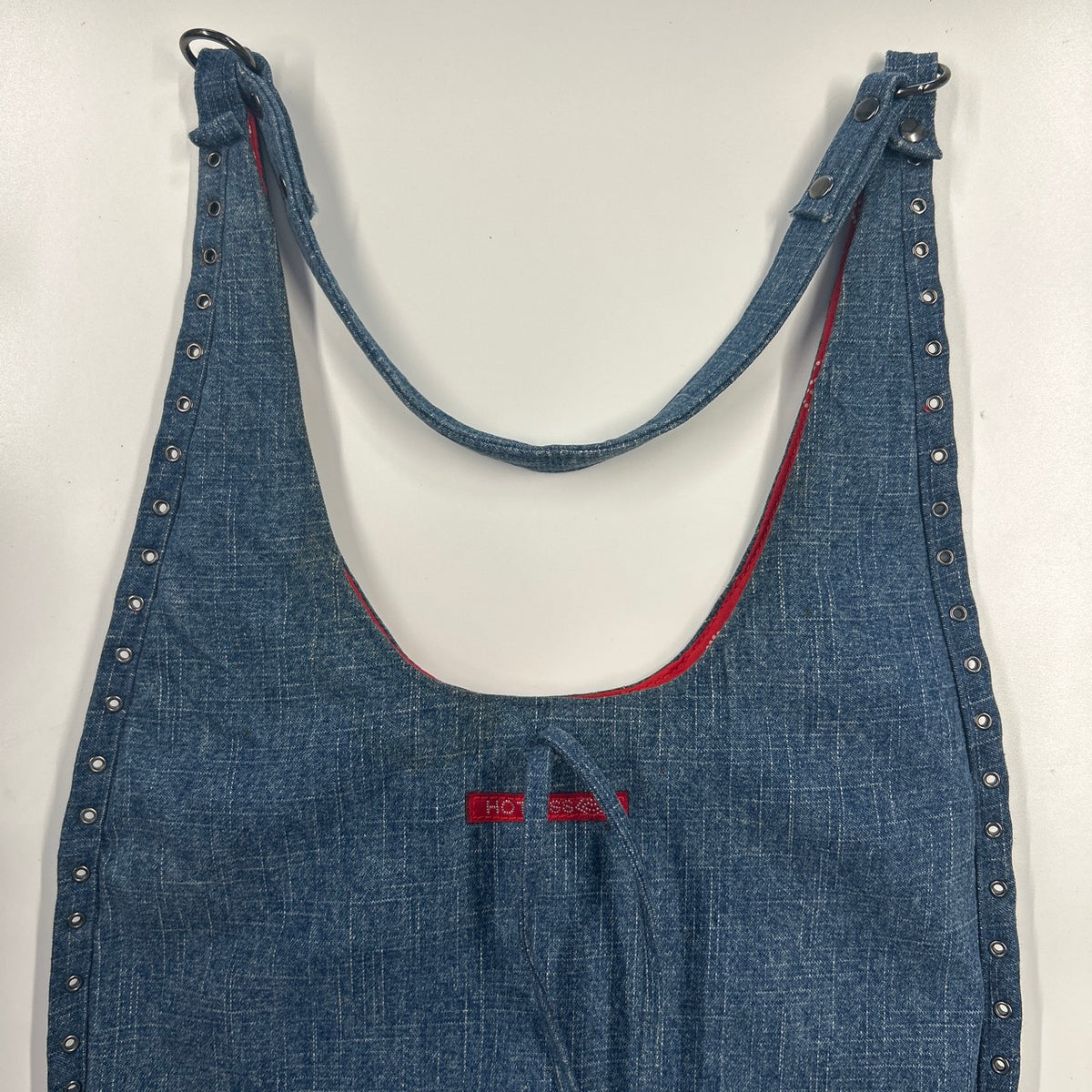 blue denim eyelet shoulder bag