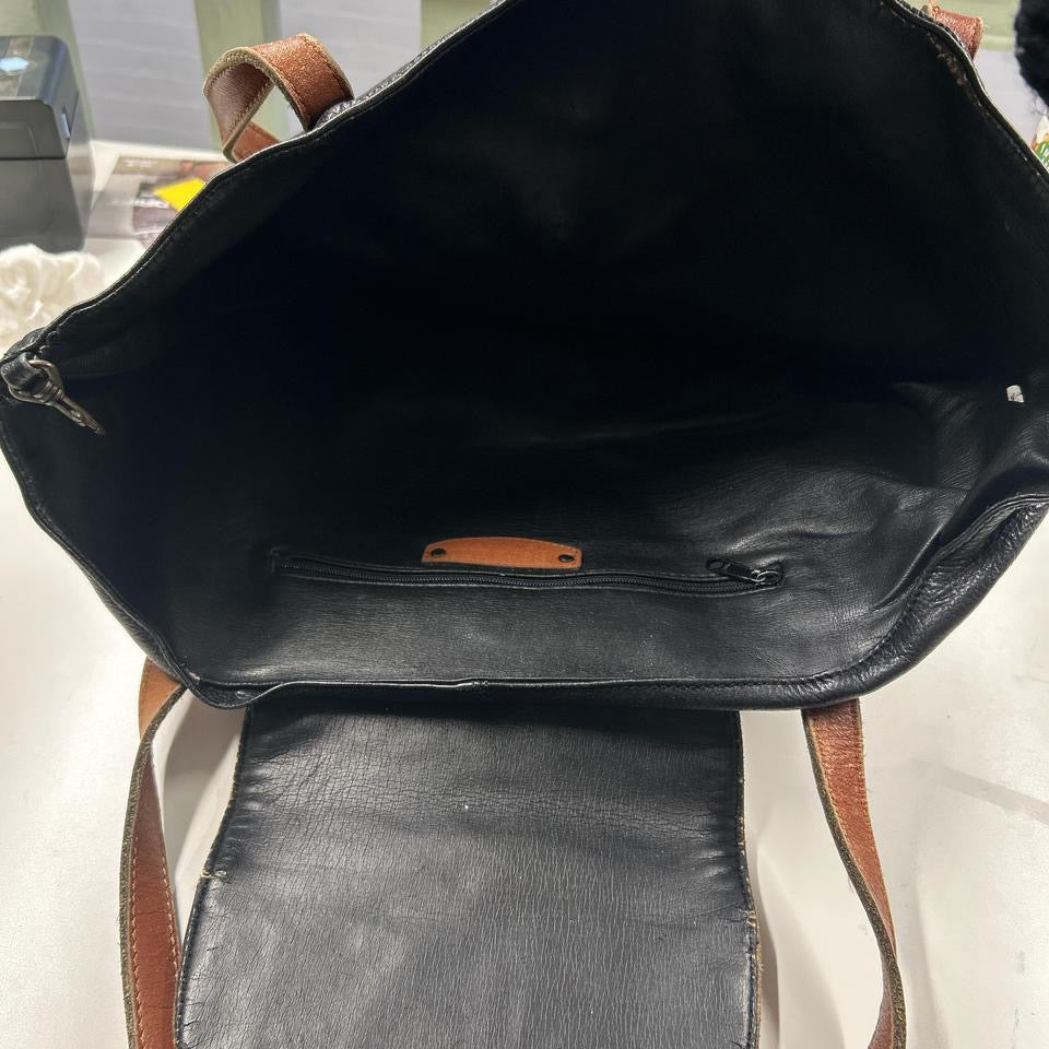 black and brown studded western shoulder bag