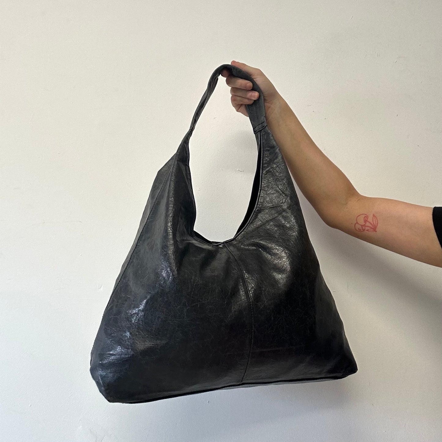 charcoal black faux leather slouchy shoulder bag
