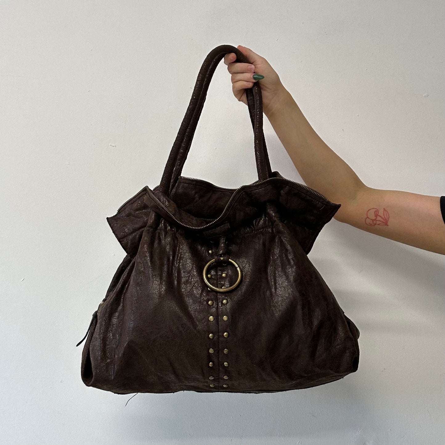 brown studded faux leather slouchy  shoulder bag