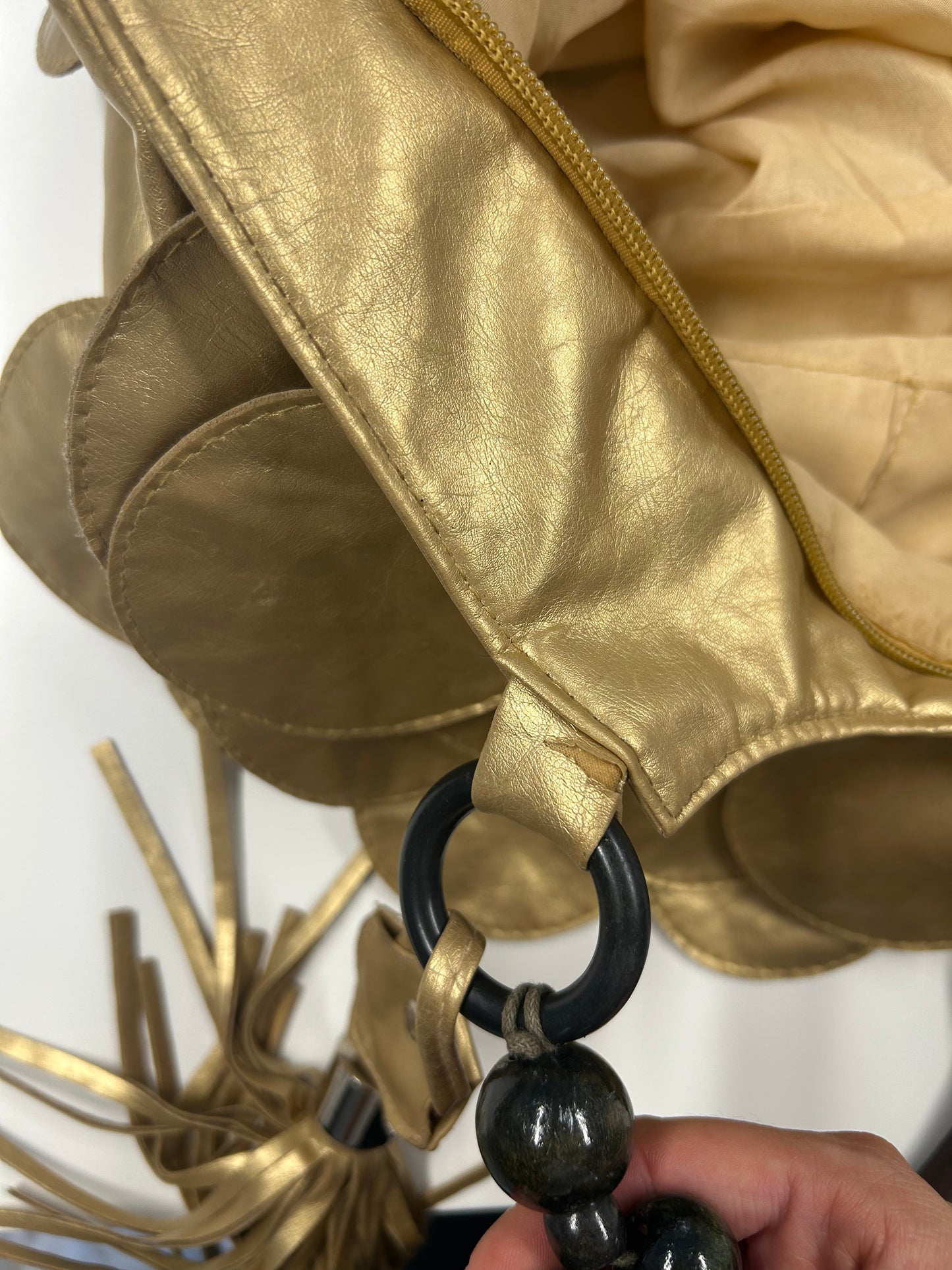 gold faux leather disc beaded shoulder bag