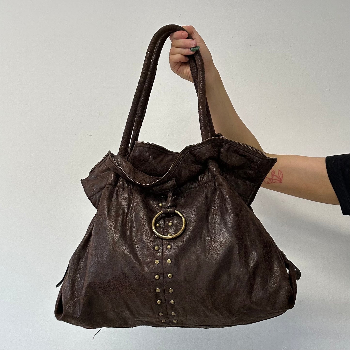 brown studded faux leather slouchy  shoulder bag
