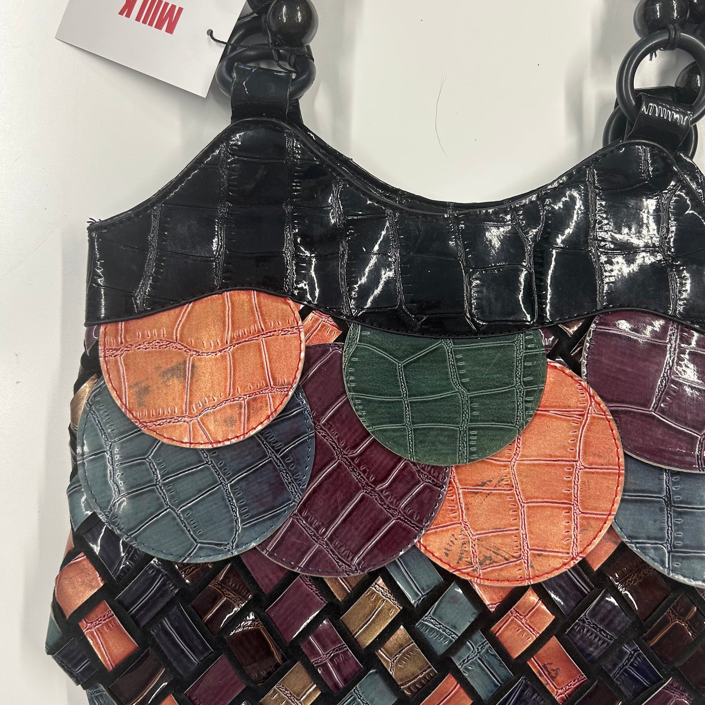 multicoloured patchwork faux leather beaded disc woven shoulder bag