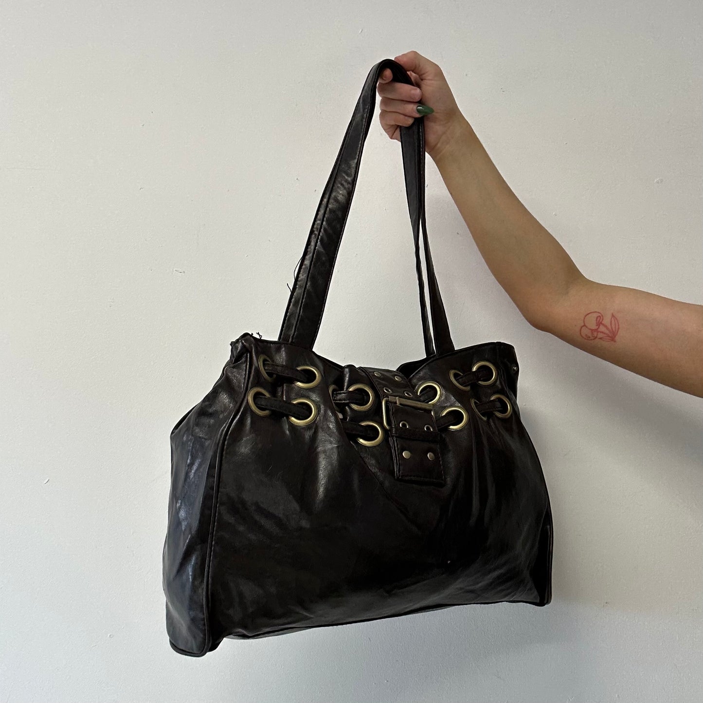 brown faux leather eyelet studded shoulder bag