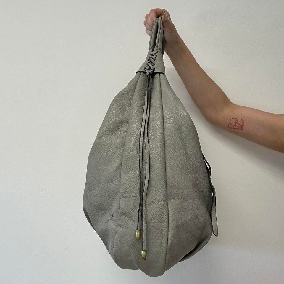 grey studded slouchy faux leather shoulder bag