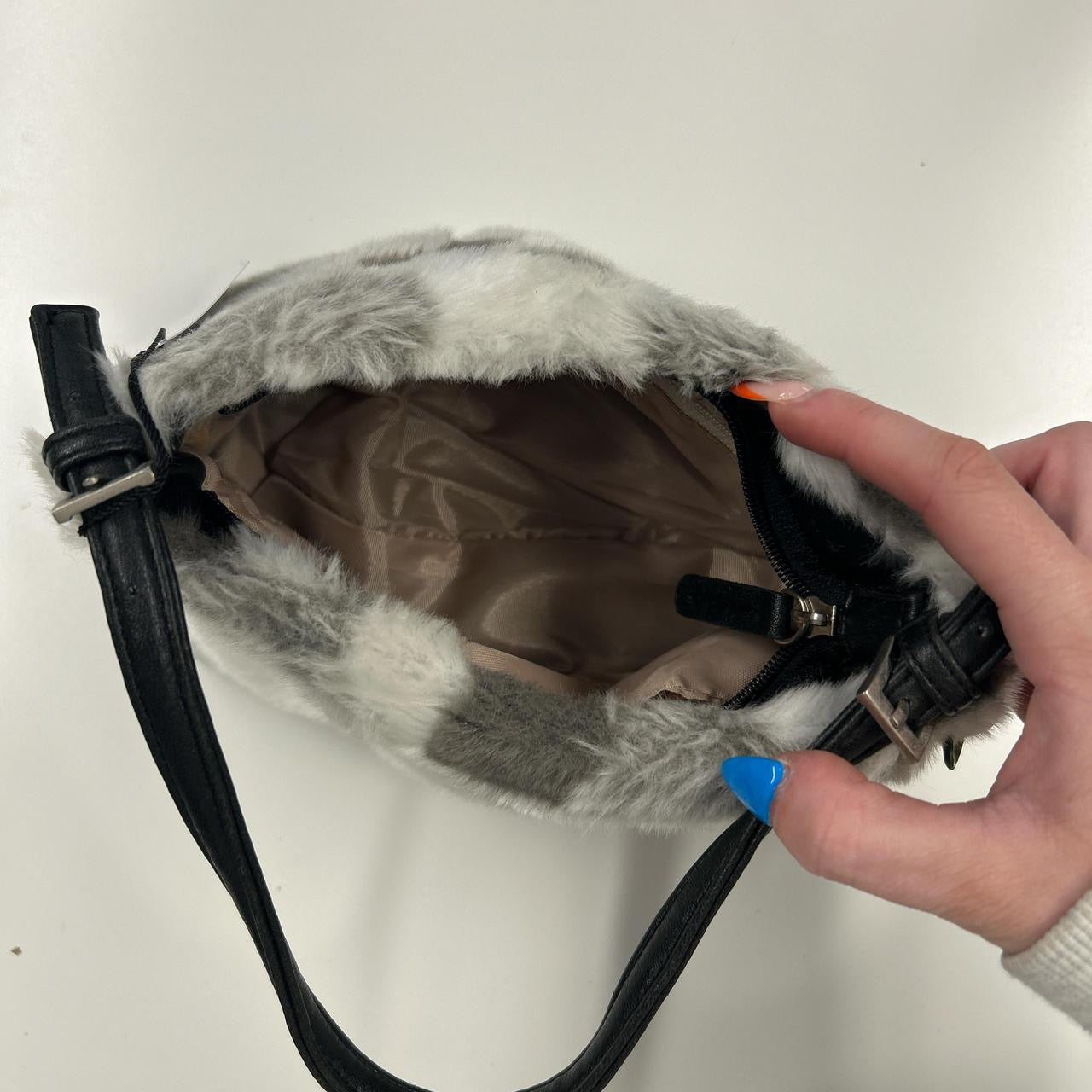 grey and white fluffy shoulder bag
