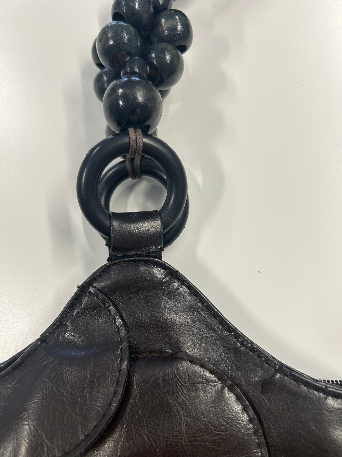 dark brown faux leather disc beaded shoulder bag