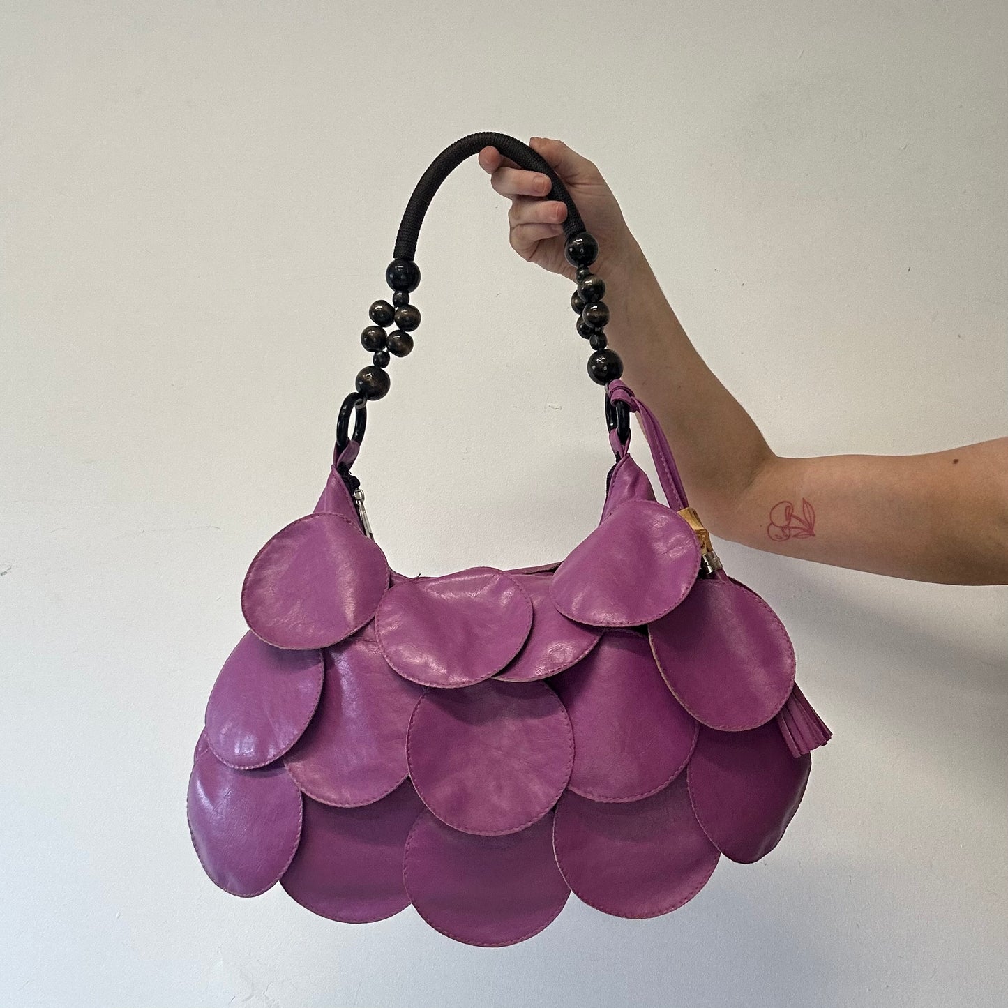 purple faux leather disc beaded shoulder bag
