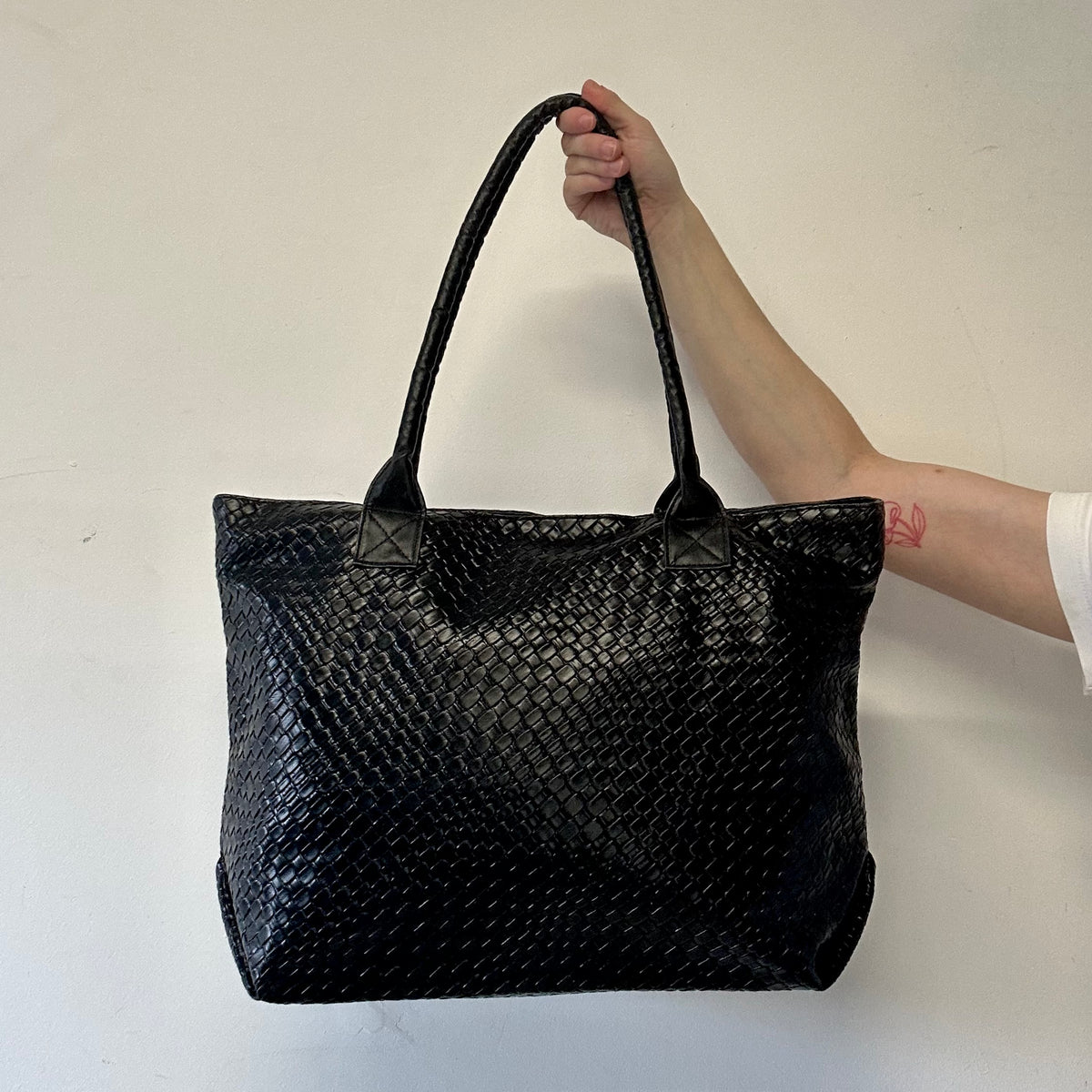black faux leather woven effect shoulder bag