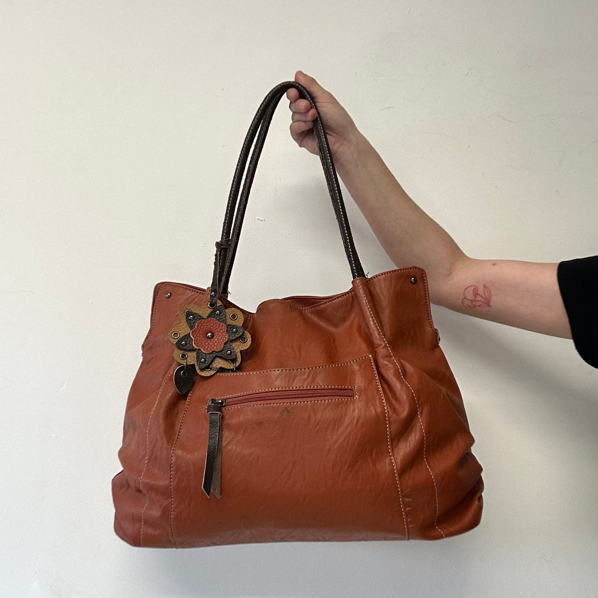 burnt orange brown faux leather flower detail shoulder bag