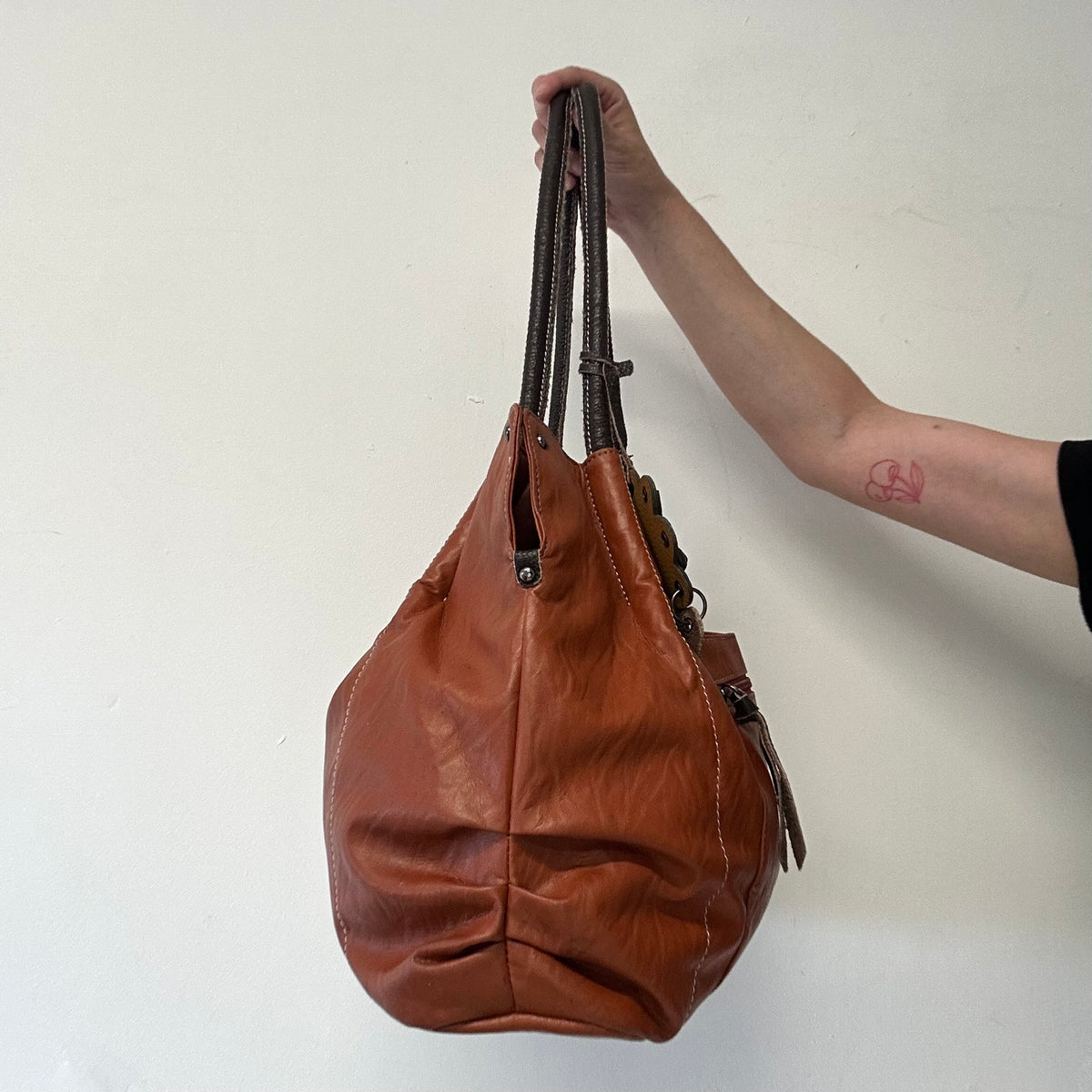 burnt orange brown faux leather flower detail shoulder bag