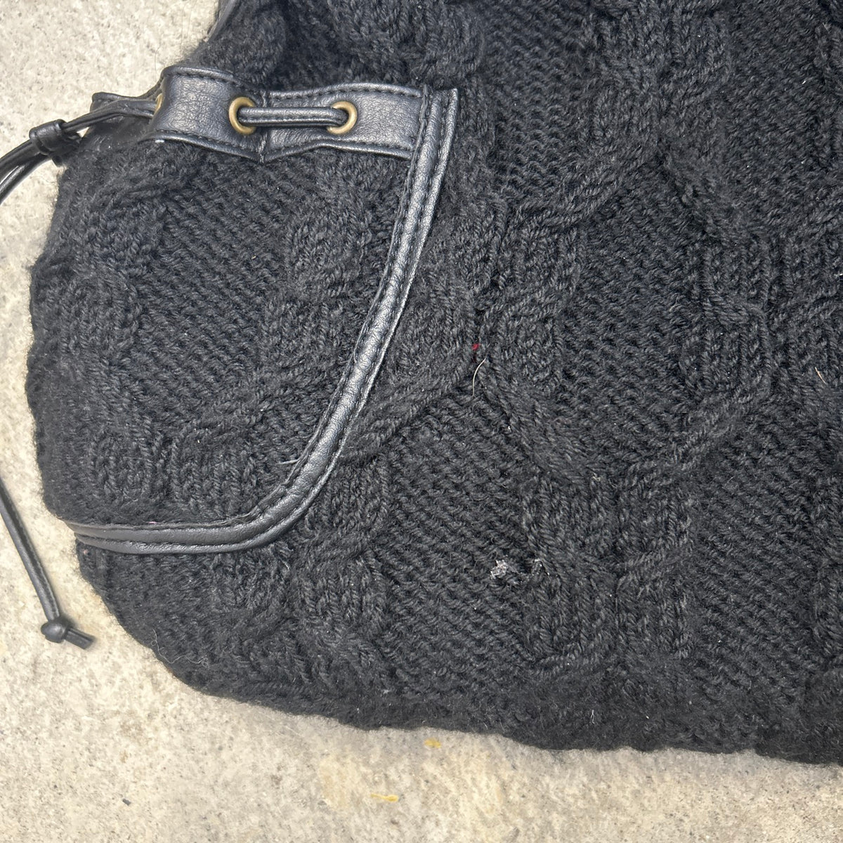 black knitted slouchy shoulder bag