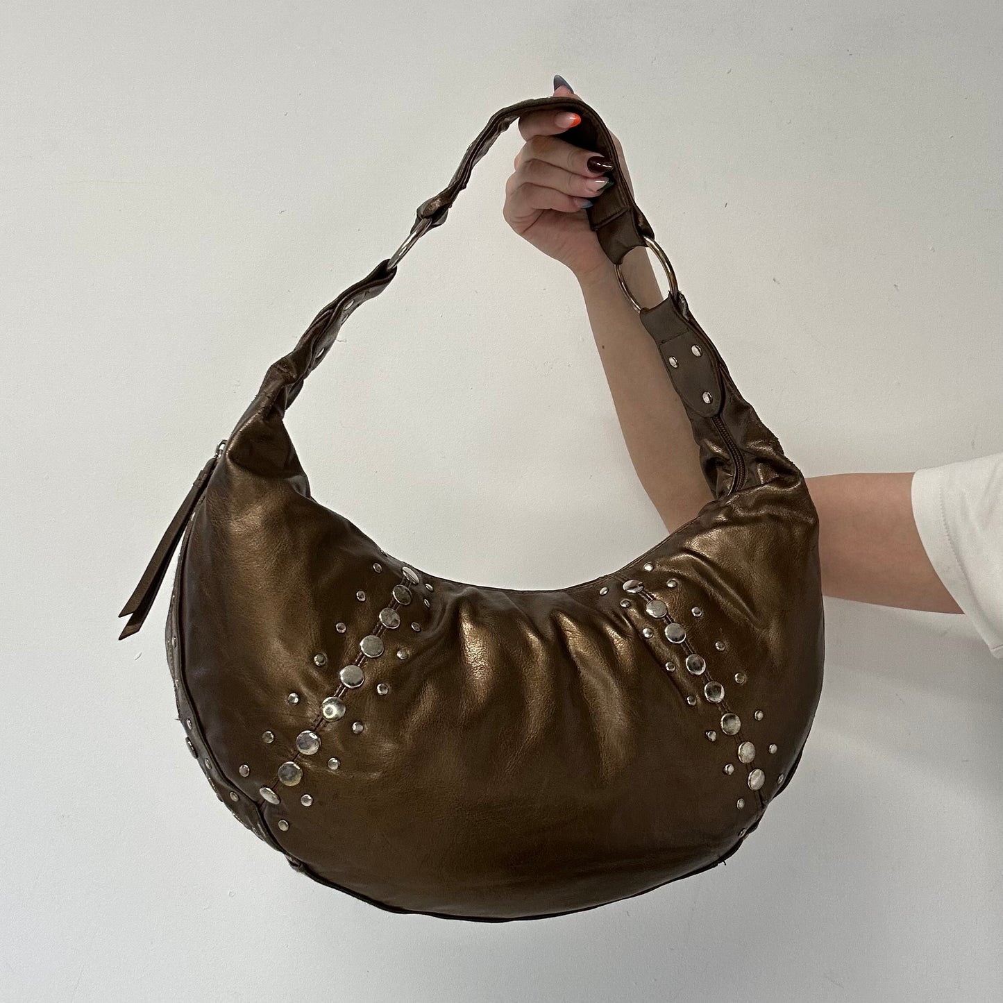 brown studded faux leather half crescent shoulder bag