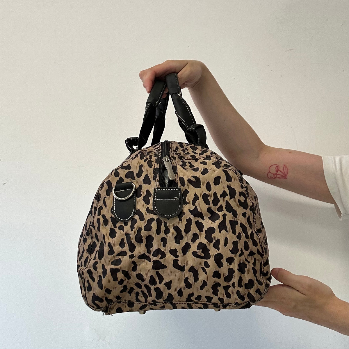 brown patterned faux leather shoulder bag