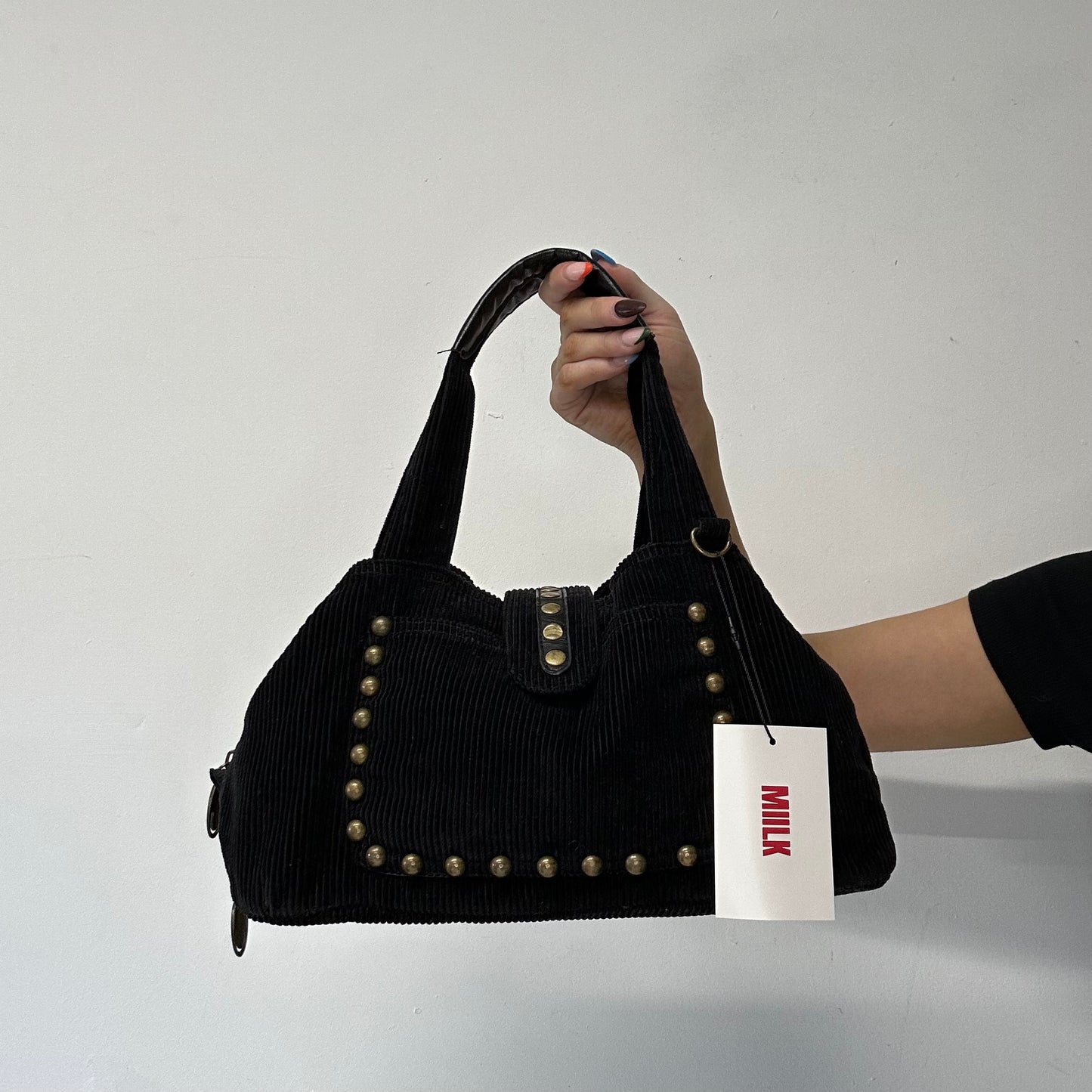 black corduroy studded shoulder bag