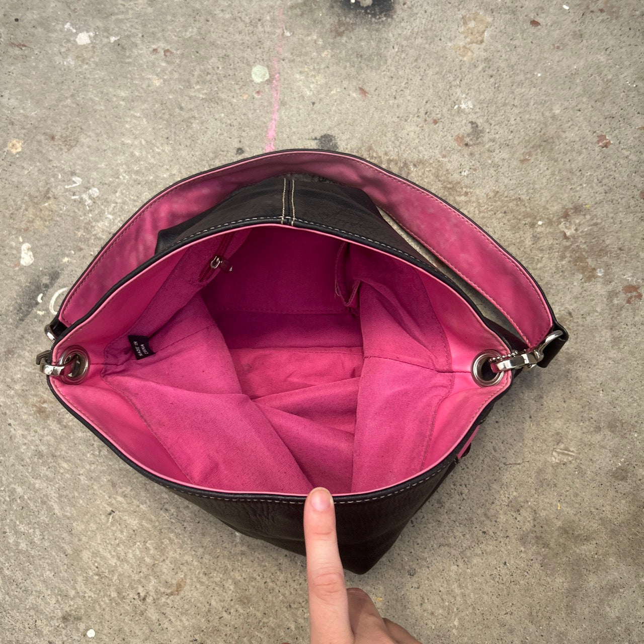 black and pink “J”  faux leather shoulder bag