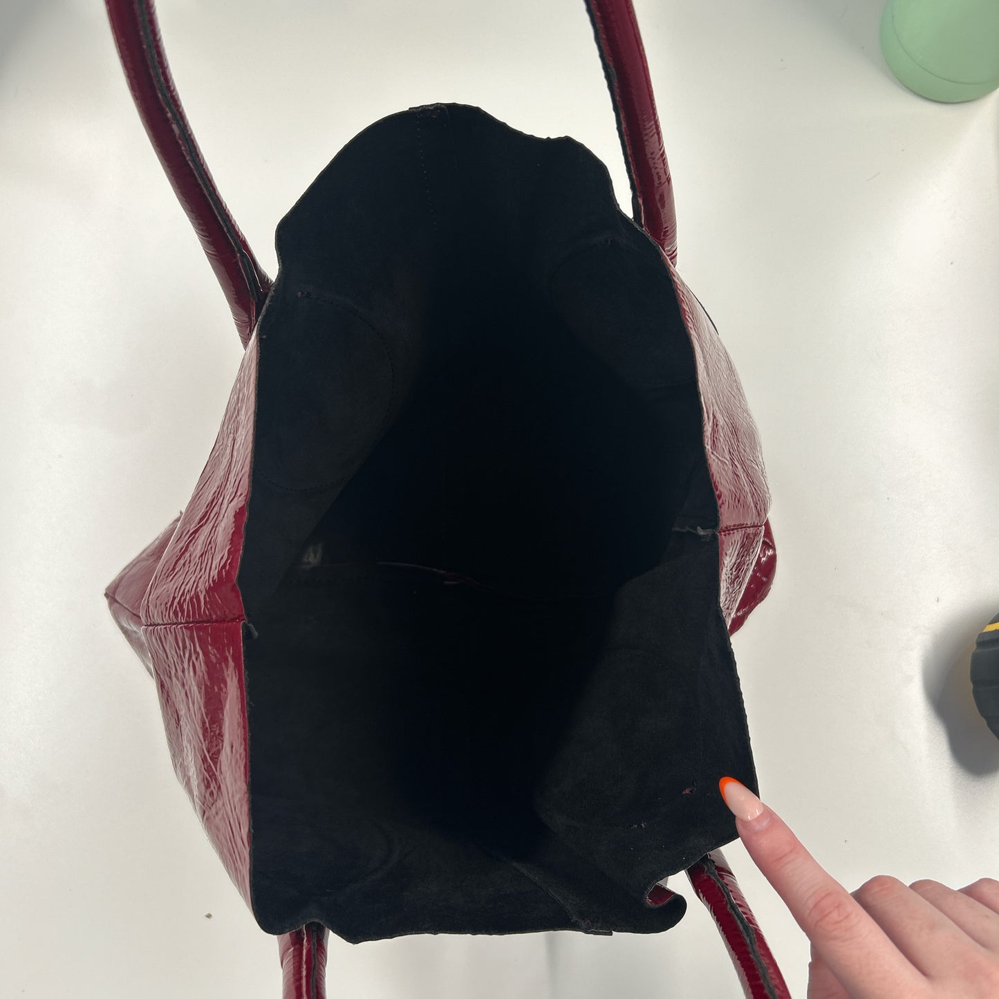red lightweight patent shoulder bag