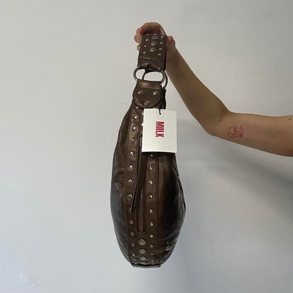 brown studded crescent faux leather shoulder bag