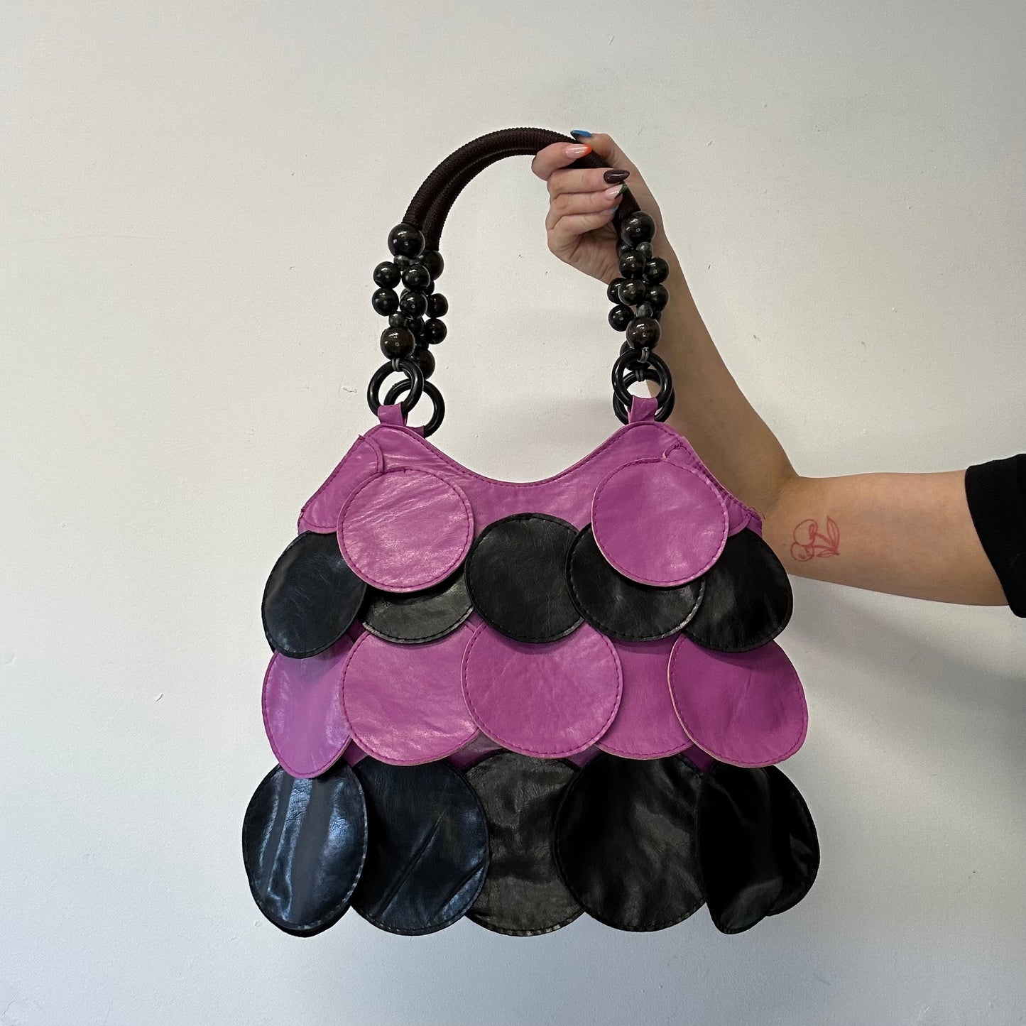 pink and black faux leather disc beaded shoulder bag