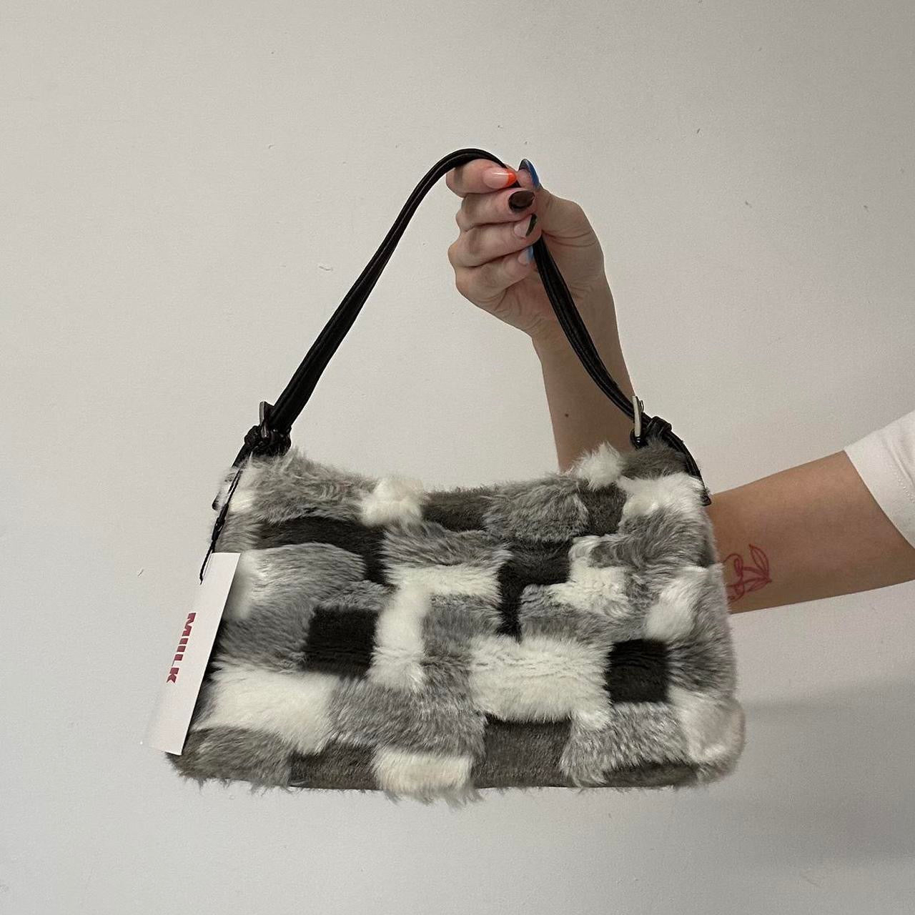 grey and white fluffy shoulder bag