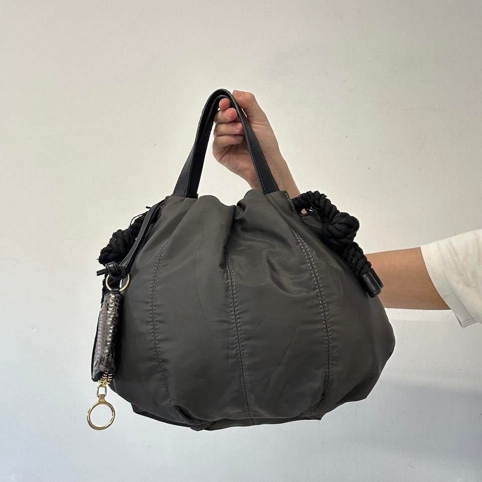 grey double zip drawstring hand bag