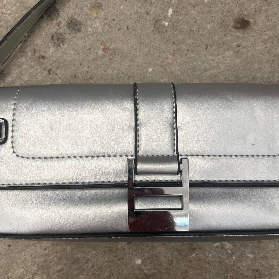 silver oversized buckle shoulder bag