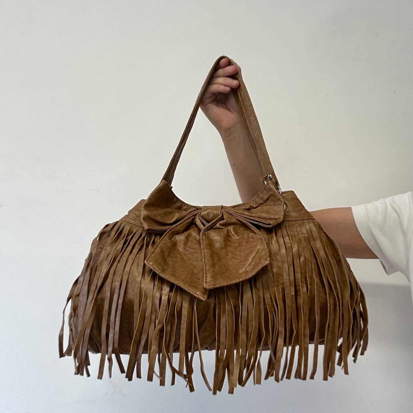 brown fringe oversized bow faux leather shoulder bag