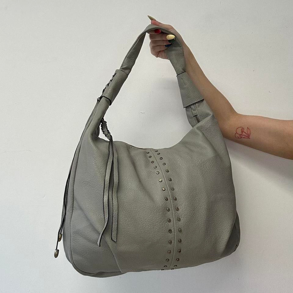 grey studded slouchy faux leather shoulder bag