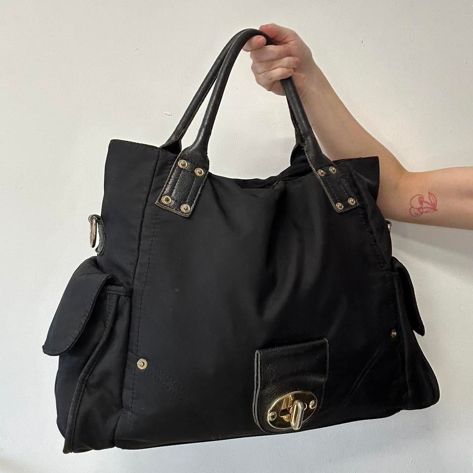 black canvas buckle shoulder bag