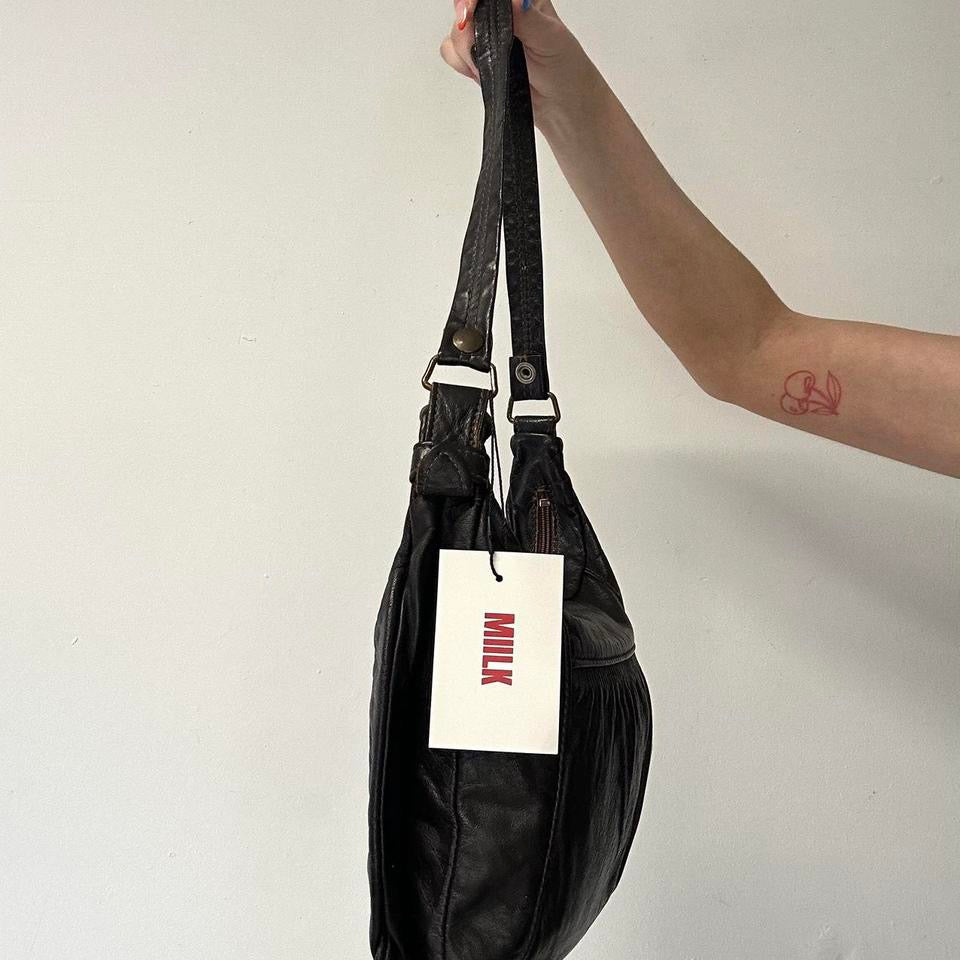 brown leather one strap shoulder bag