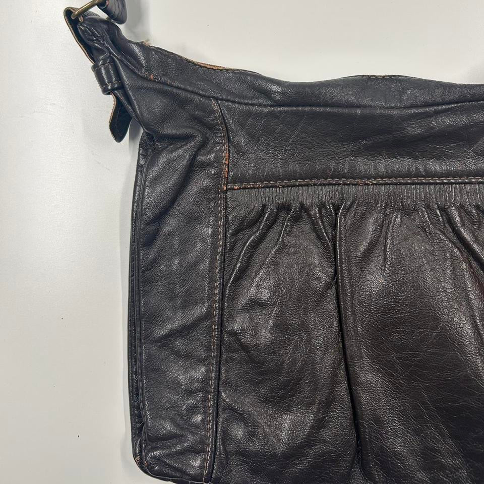 brown leather one strap shoulder bag